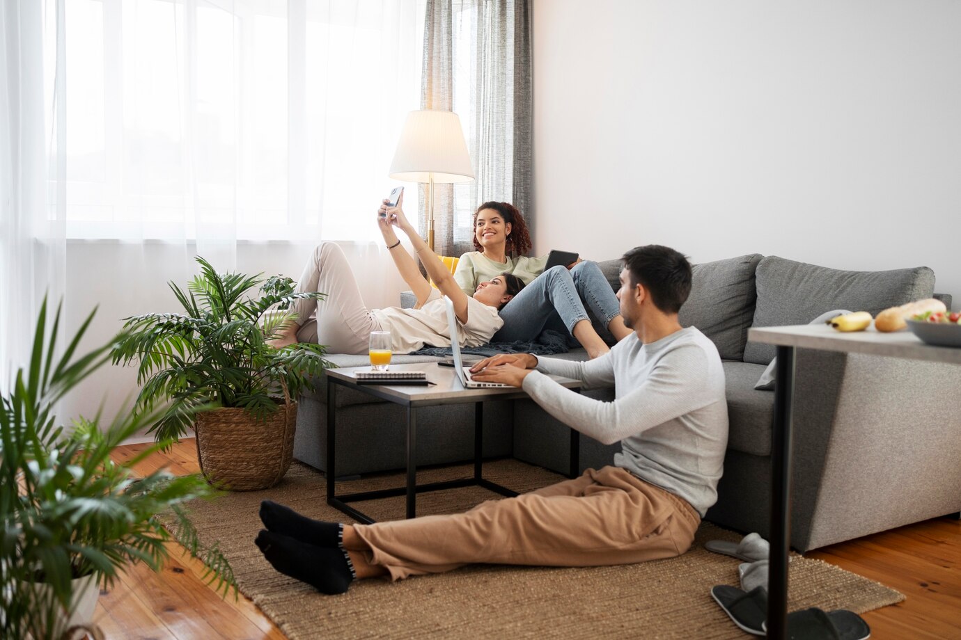 roommates-doing-activities-indoors-full-shot_23-2149485669.jpg